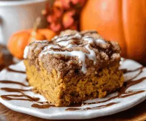 Delicious homemade pumpkin coffee cake topped with crumbly streusel, perfect for fall breakfast or dessert
