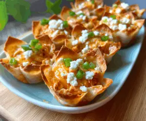 Delicious Buffalo Chicken Wonton Cups with crispy shells and spicy filling, perfect for appetizers.