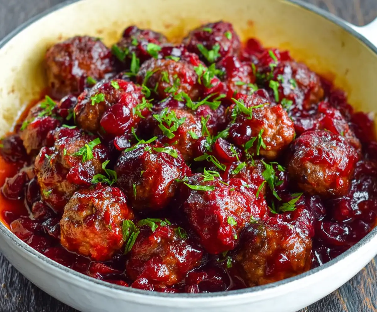 Delicious homemade cranberry meatballs served on a platter, perfect for holiday parties.