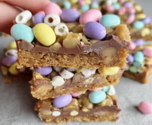 Easter Goody Bars decorated with colorful sprinkles and chocolate for festive celebration.
