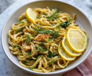 Delicious browned butter lemon dill pasta served in a bowl with fresh herbs